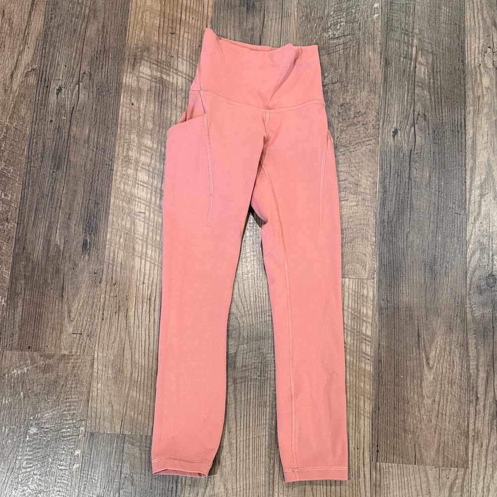 Lululemon dusty rose color leggings with pockets size 0